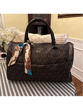 Michael Kors brown Monogram duffel bag